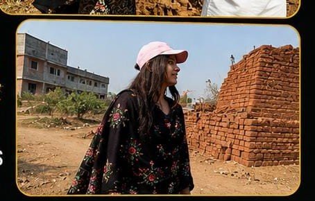 Volunteer walking through village